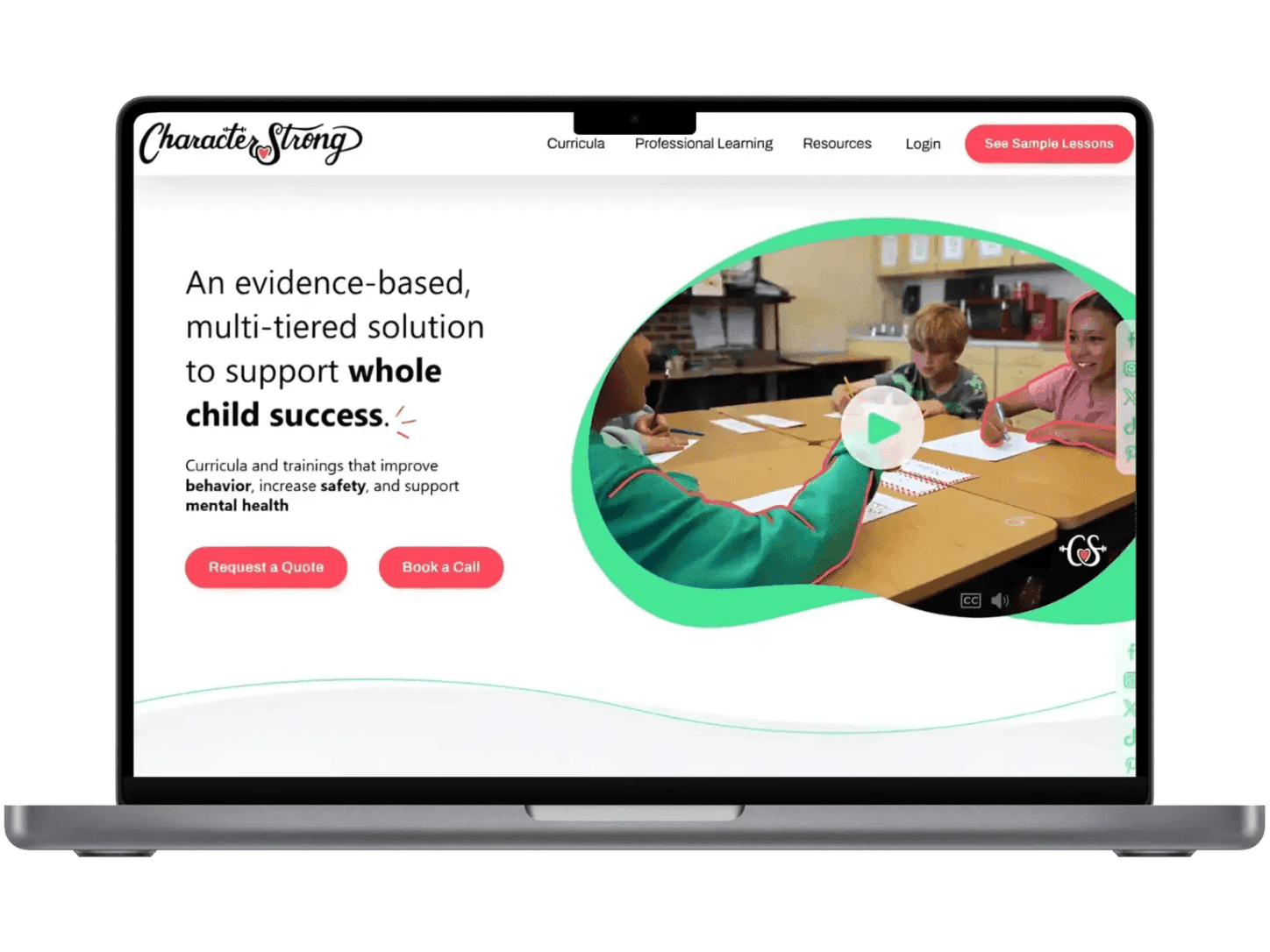 The CharacterStrong site on a laptop, describing an evidence based multi tiered solution for whole child success, beside a video still of pupils working together at a table.